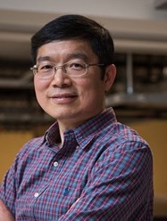 A distinguished looking East Asian man of middling years.